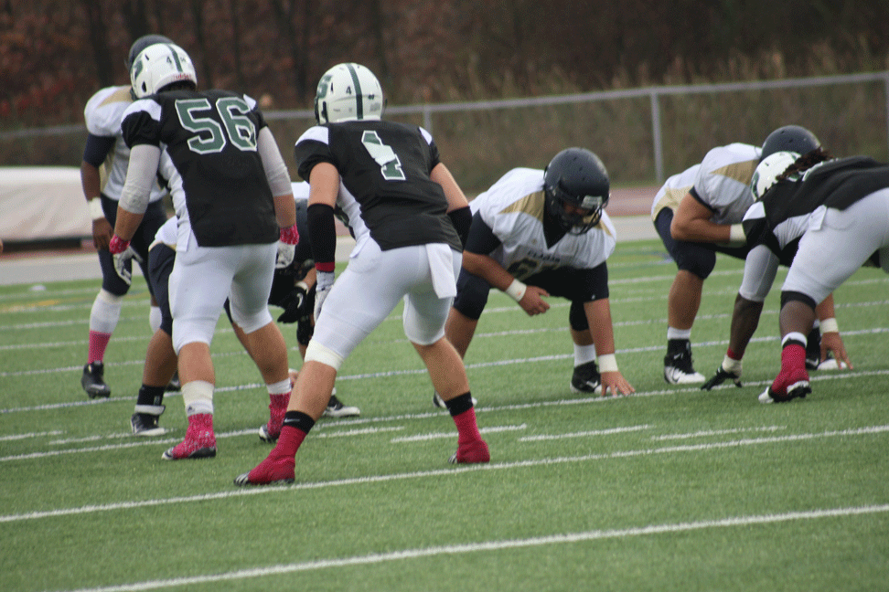  Redshirt senior linebacker Bob Westerlund sets up for the snap at the Homecoming game last Saturday against Clarion University. Westerlund’s zero fell off of his No. 40 jersey during the game, leaving just a No. 4 on his back. Former Slippery Rock linebacker Zach Sheridan previously wore No. 4.