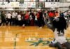 Rock fans storm the court after victory over IUP