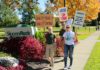 Students stand on the picket line bordering campus in support of union members on strike