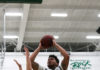Reynolds placed on administrative leave, Grady to serve as acting head coach