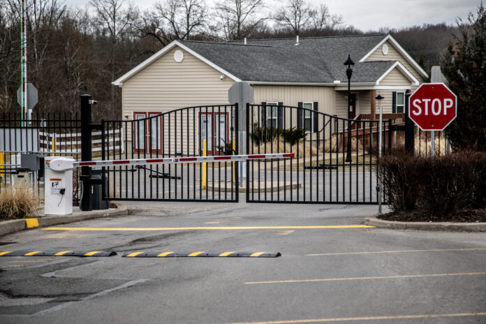 The entrance security gate at The Grove Apartments in Slippery Rock, pa