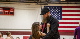 Father-Daughter Valentine’s Dance melts hearts Father and daughter Robert and Journey Michaels are pictured dancing on the dance floor together.