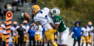 Rock football wins 15th straight season opener