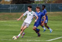 Rock drops defensive battle against Walsh