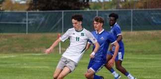 Rock drops defensive battle against Walsh