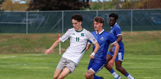 Rock drops defensive battle against Walsh