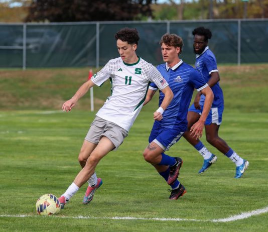 Rock drops defensive battle against Walsh