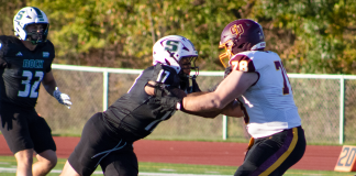 Second-half surge keeps no. 8 Rock perfect